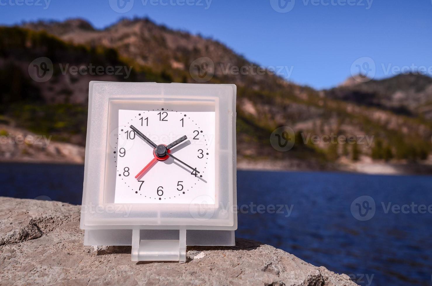 Clock on the rocks photo