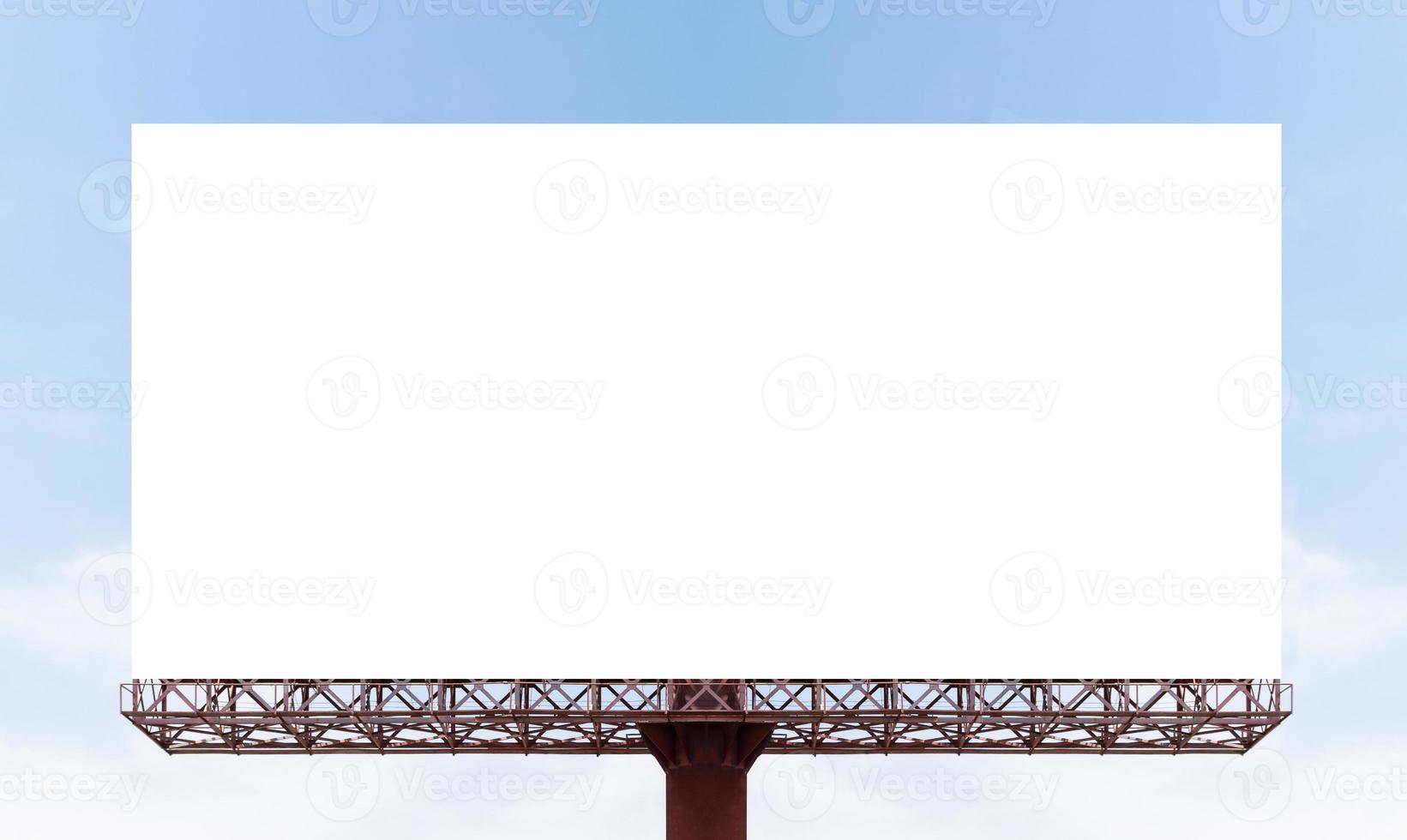 Outdoor pole billboard on blue sky background with mock up white screen and clipping path photo
