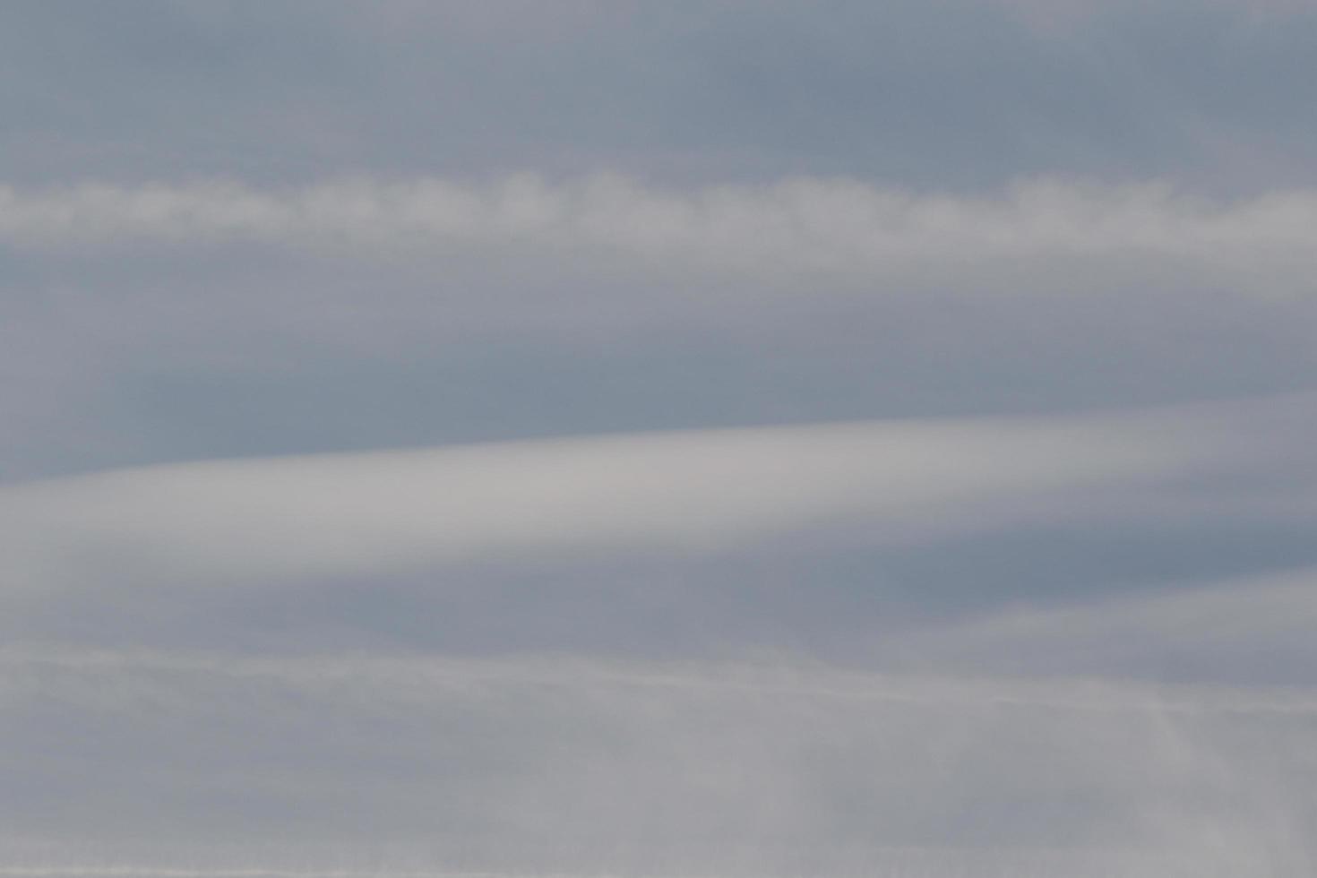 Clear blue sky and white clouds photo