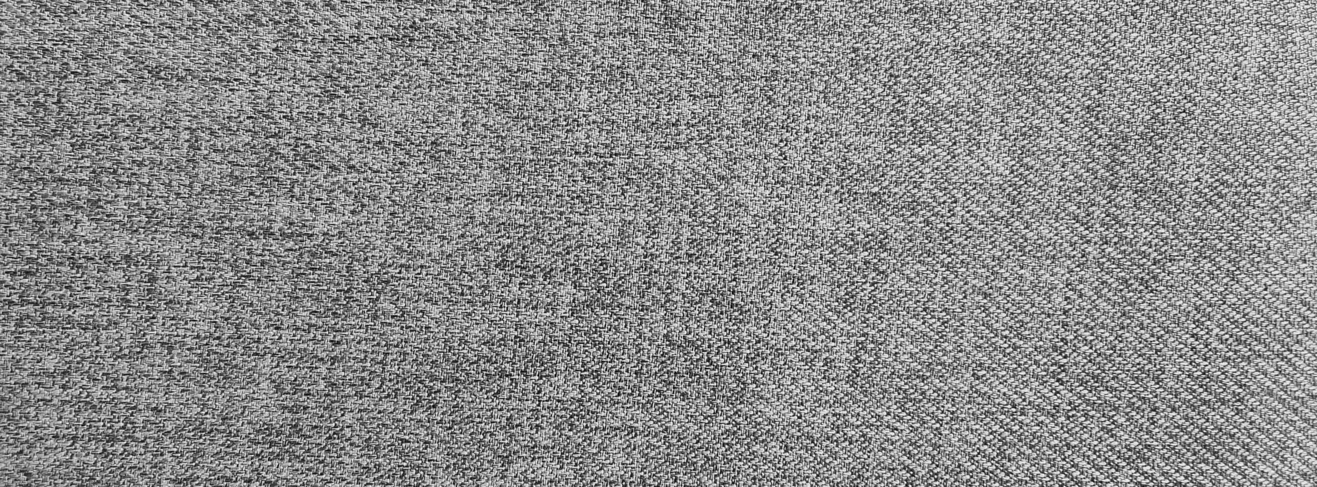 gray canvas texture, fabric background. seamless texture of gray dots, lines, pixels on black background. Black inversion of free structures photo
