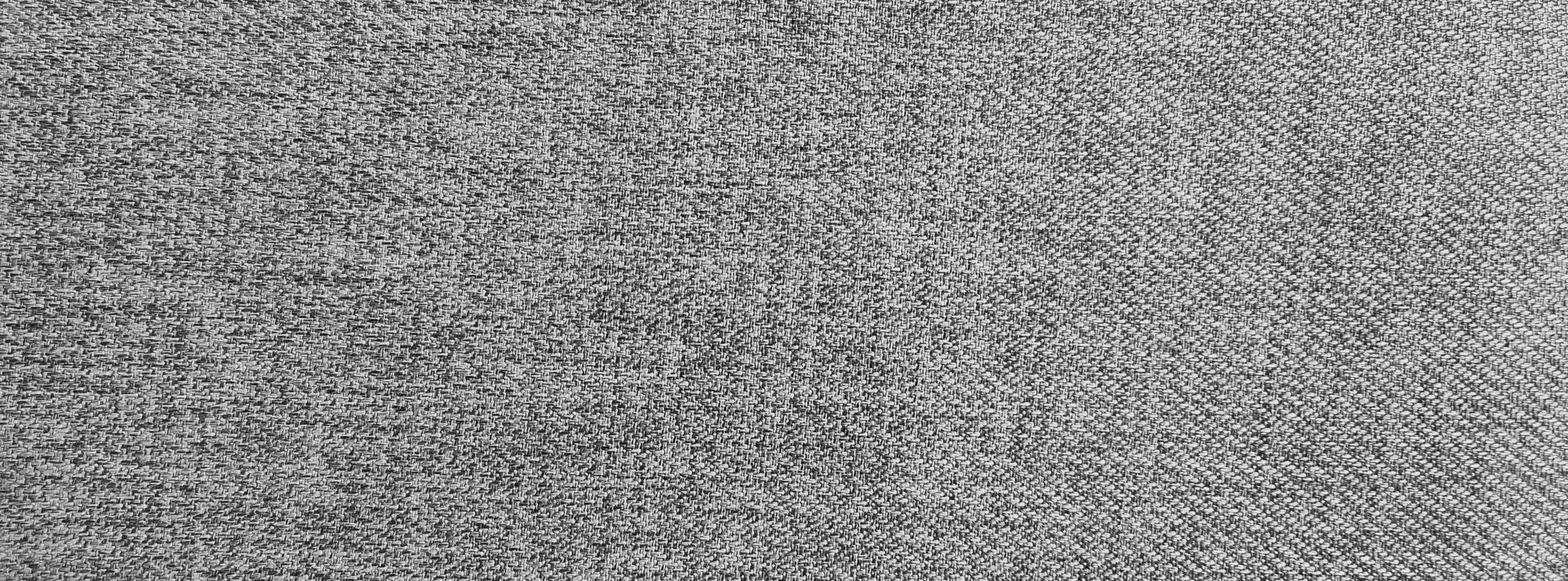 gray canvas texture, fabric background. seamless texture of gray dots, lines, pixels on black background. Black inversion of free structures photo