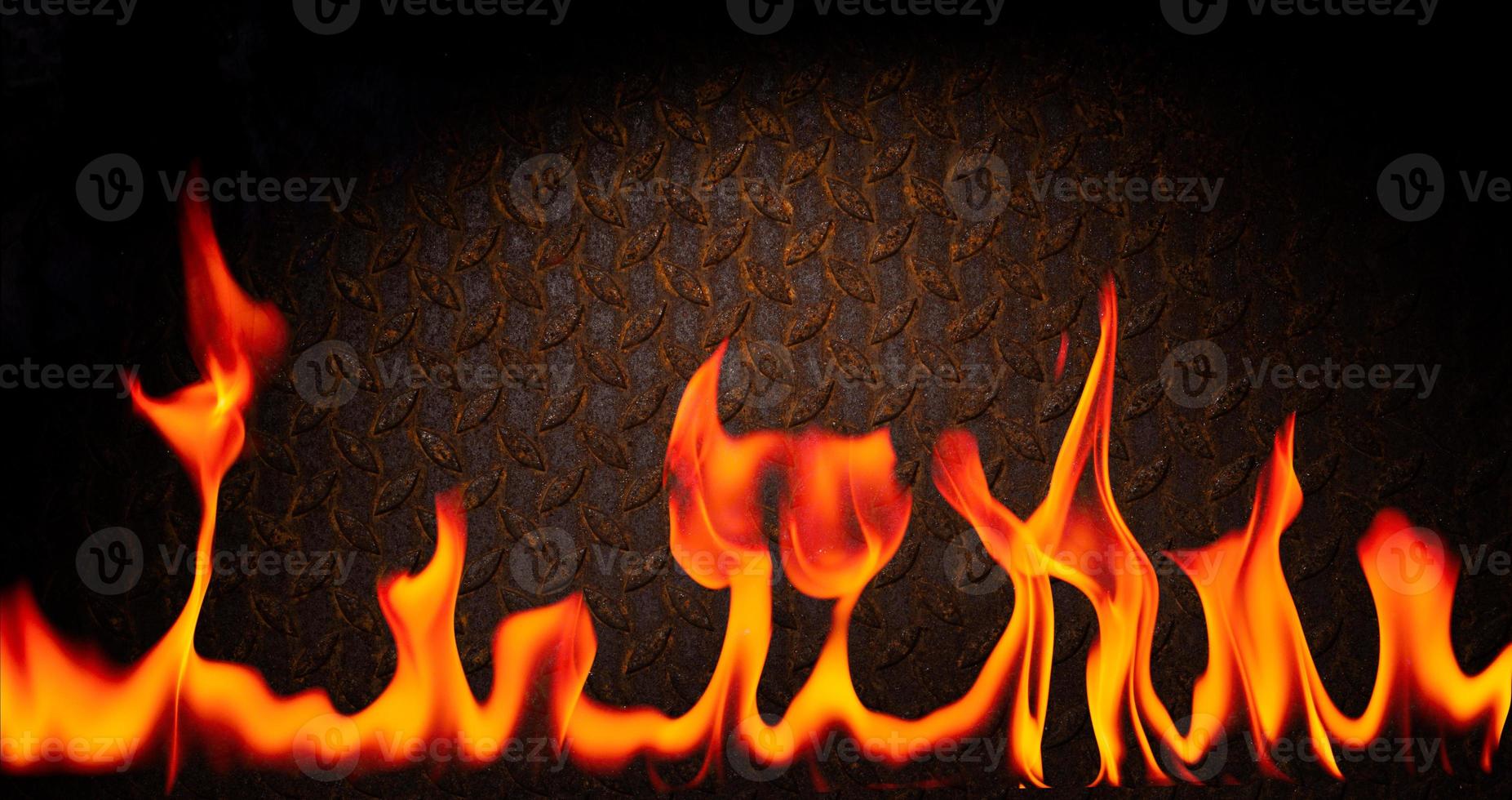 fuel flame png heat and danger of burning bbq explosion yellow-red flame isolated on rusty black steel plate background photo