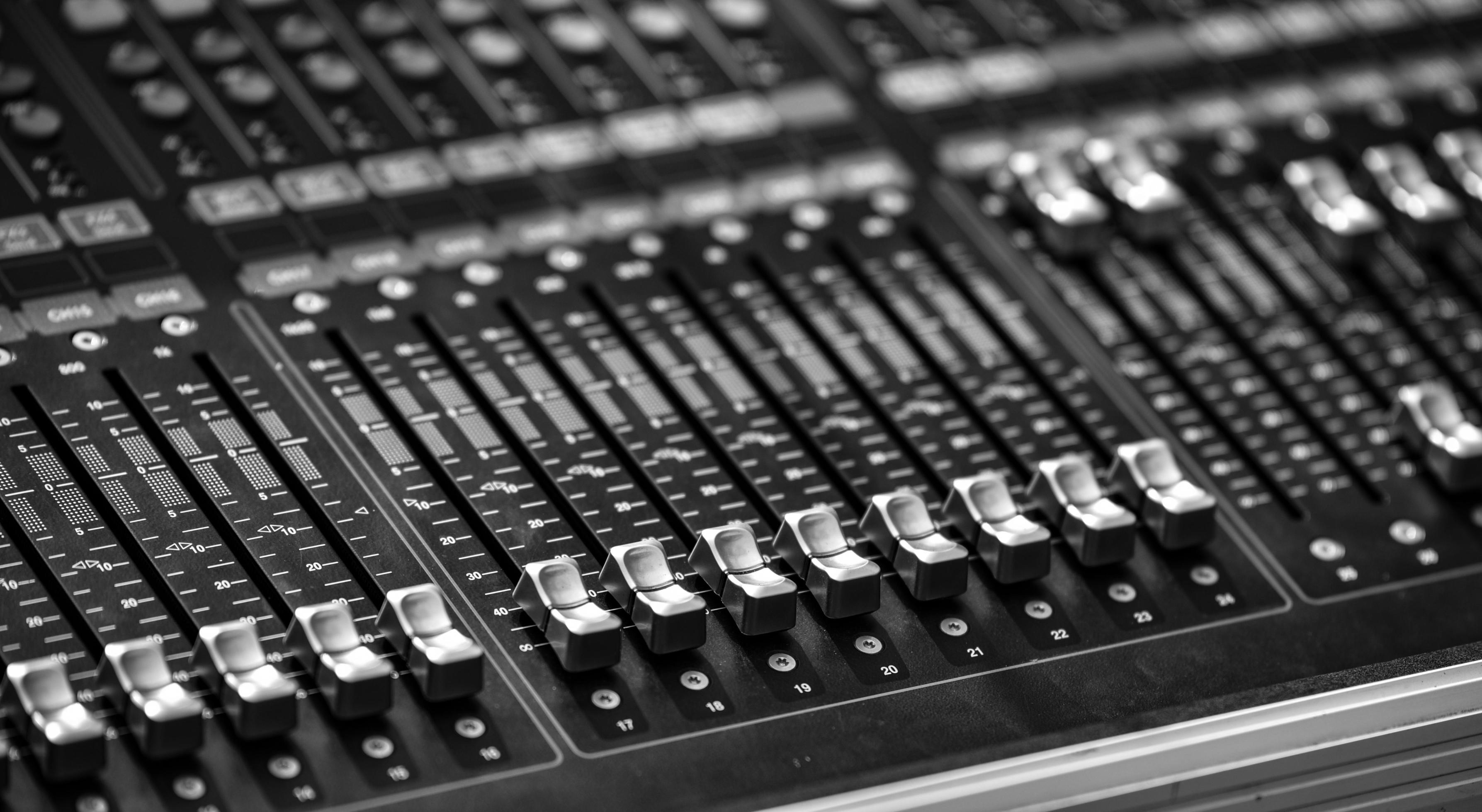 Professional audio mix sound control panel console Sound technician and lights equipment