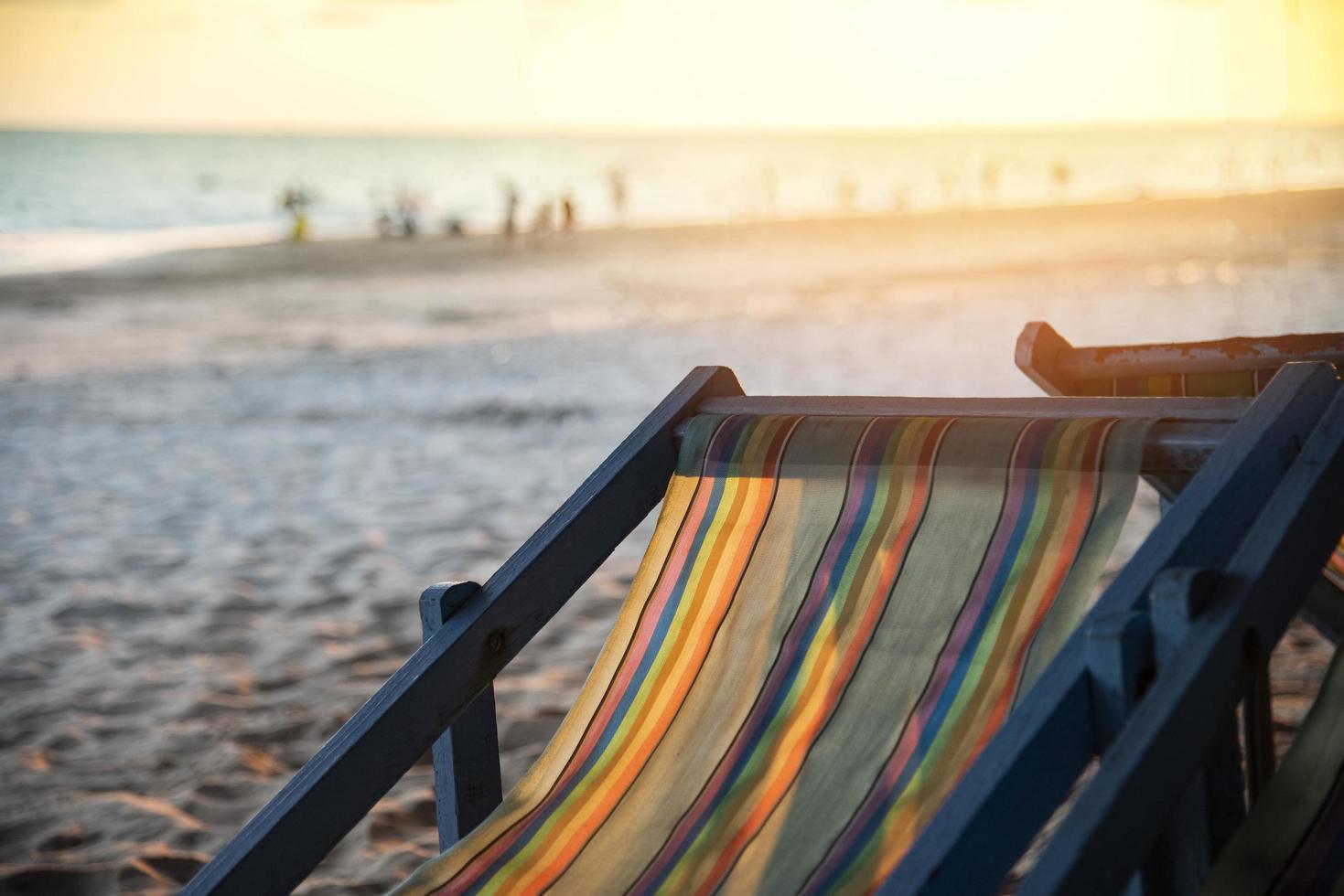 Chair beach with sunset on summer sandy beach sea vacation photo