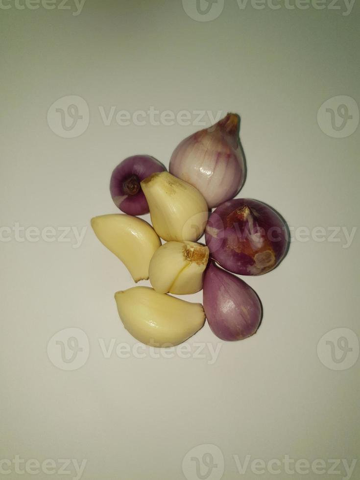 Group photo portrait of shallots and garlic as staple ingredients for cooking in Indonesia.