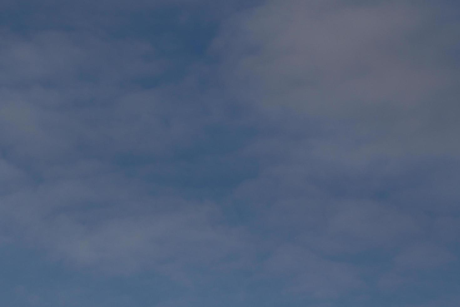 Clear blue sky and white clouds photo