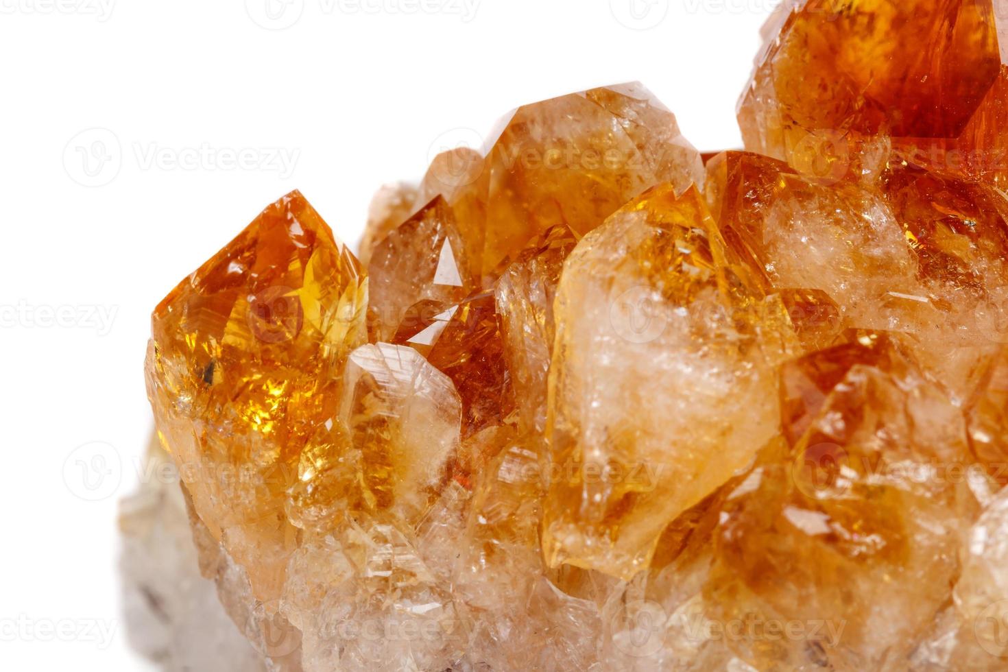 Macro mineral stone Citrine in rock in crystals on a white background photo