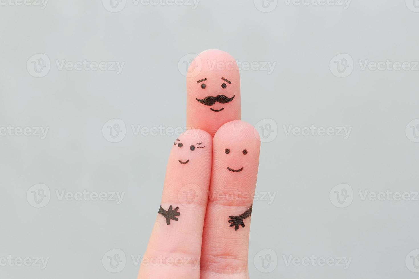 Fingers art of happy family. Concept father hugs children. photo