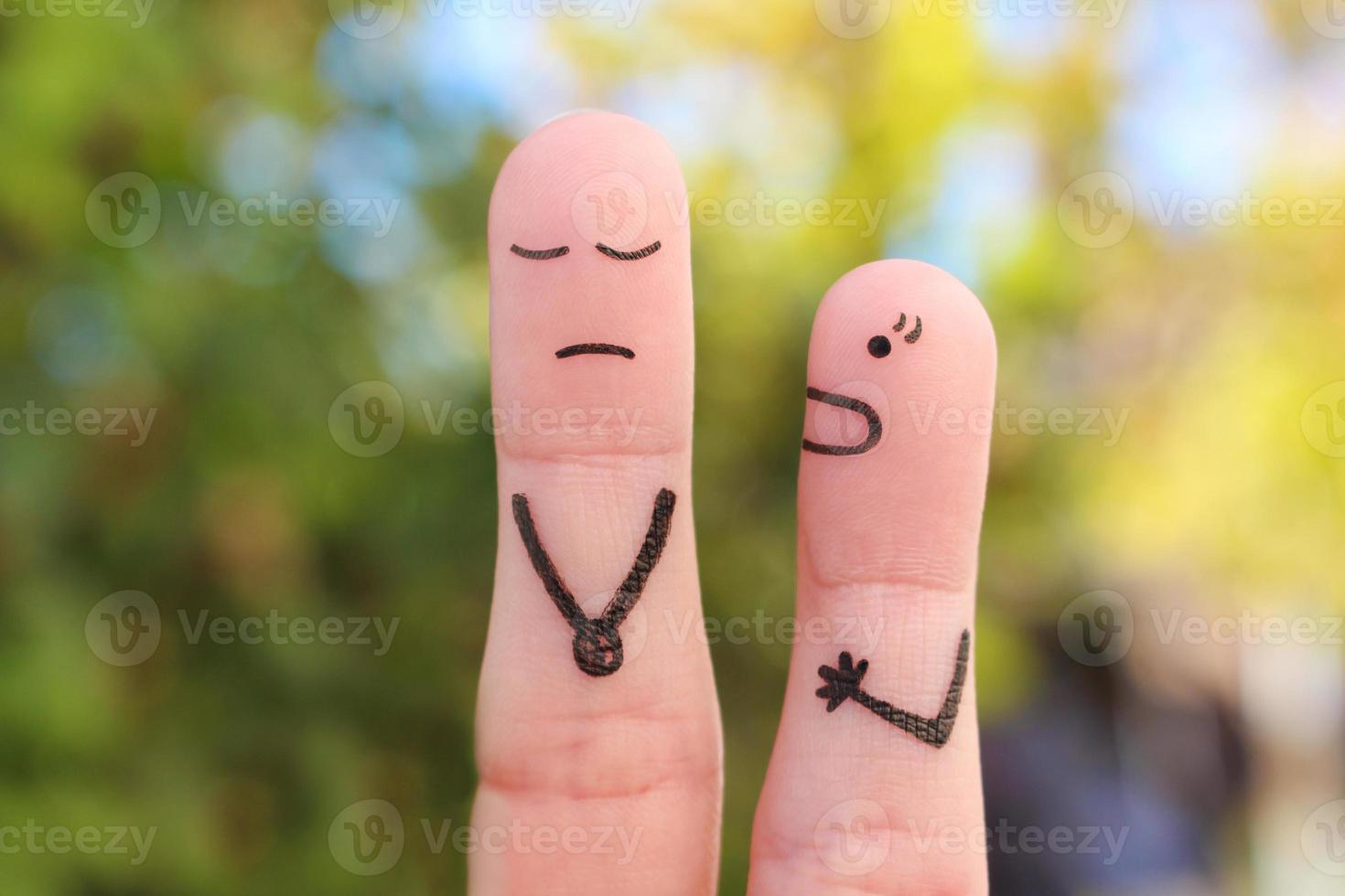 Fingers art of family during quarrel. Concept of wife shouts on husband. photo