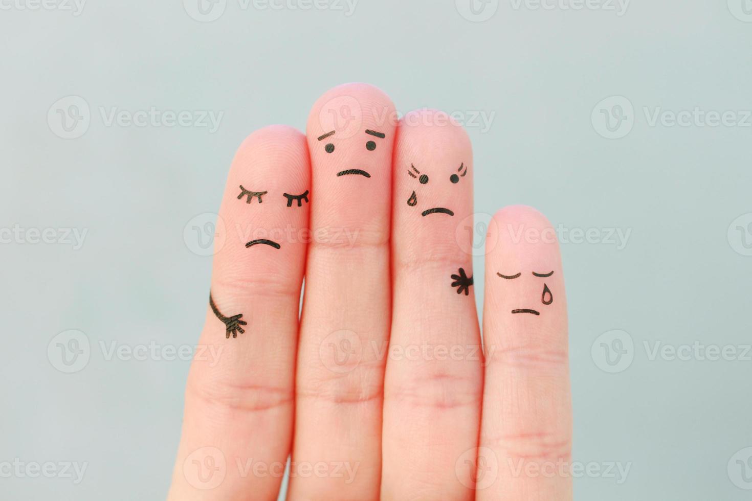 Fingers art of sad family. Concept of support in difficult situations. photo