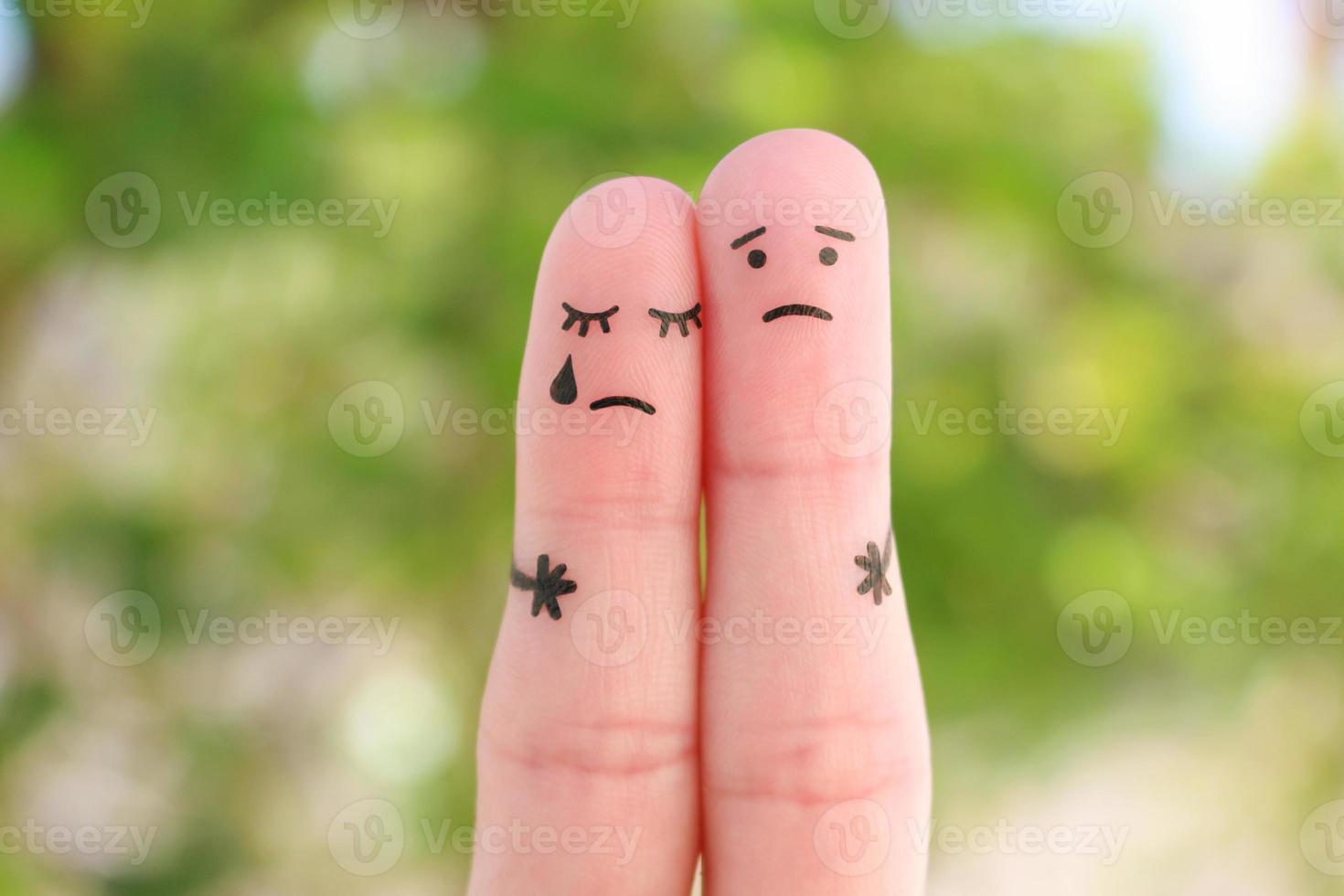 Fingers art of displeased couple. Concept of solution to the problems of family, support in difficult situations. photo
