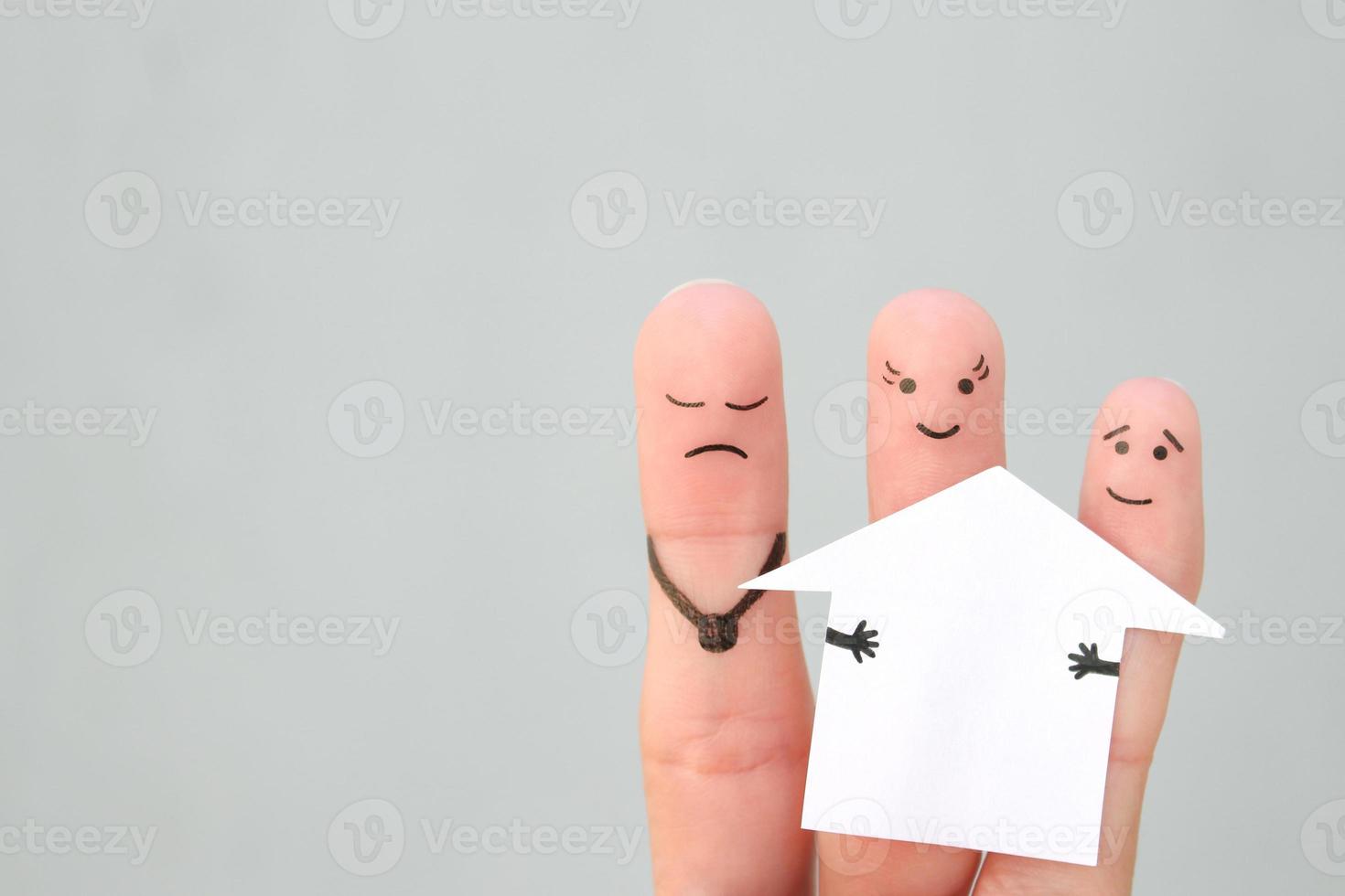 Fingers art of family during quarrel. Concept of man and woman divide house after divorce. photo