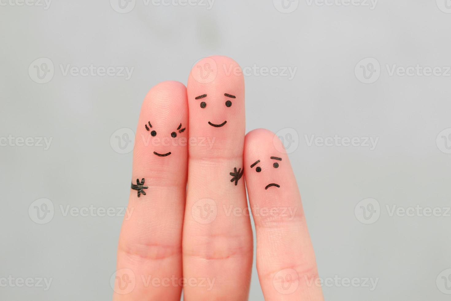 Fingers art of happy couple. Man kisses woman on cheek. Child is angry. photo