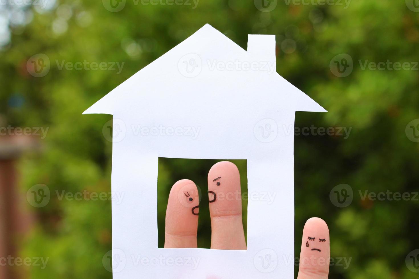 Fingers art of family during quarrel. Concept of parents quarrel, child was upset. photo