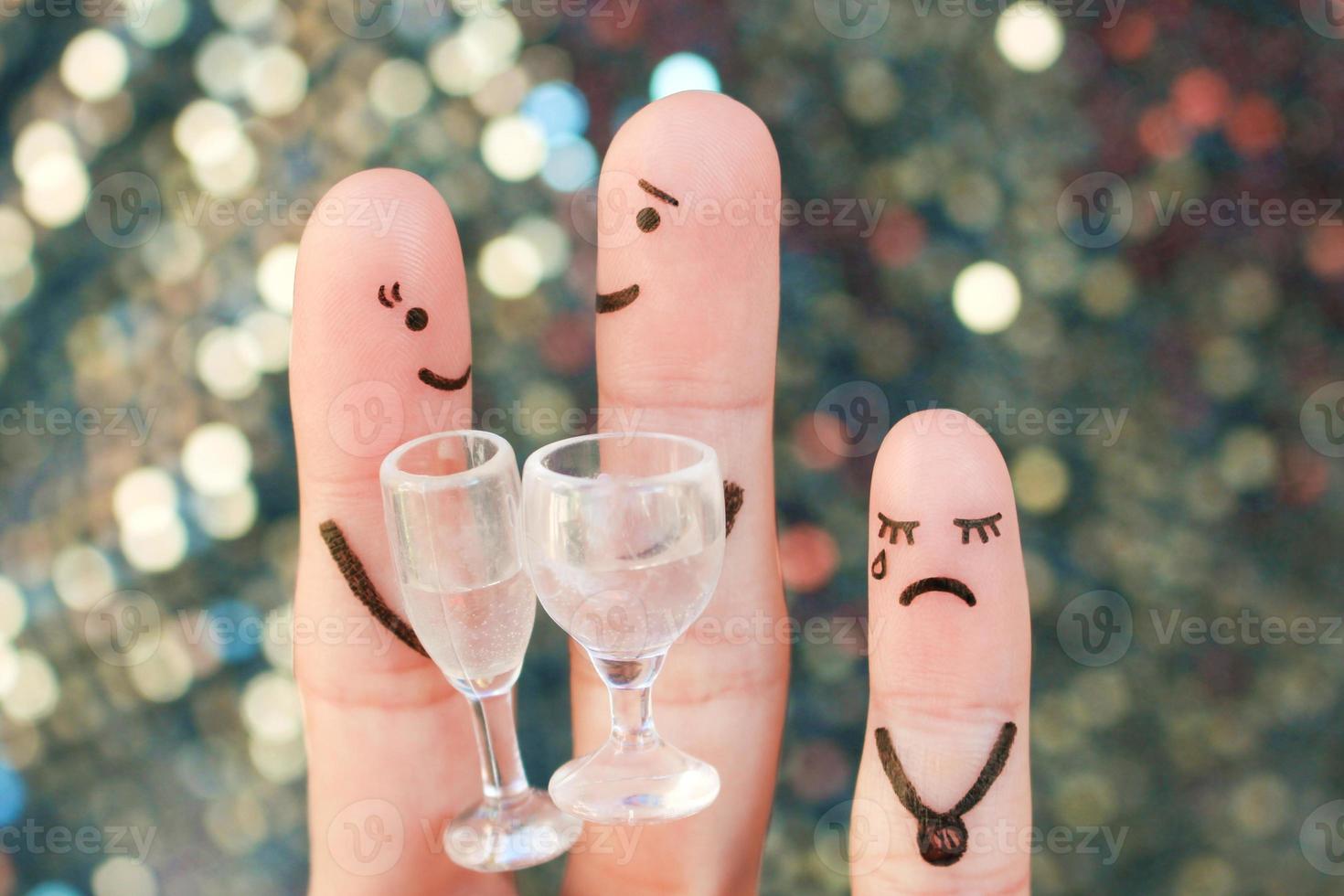 Fingers art of happy couple. Man and woman drink alcoholic beverages. Child is angry and resentful. photo