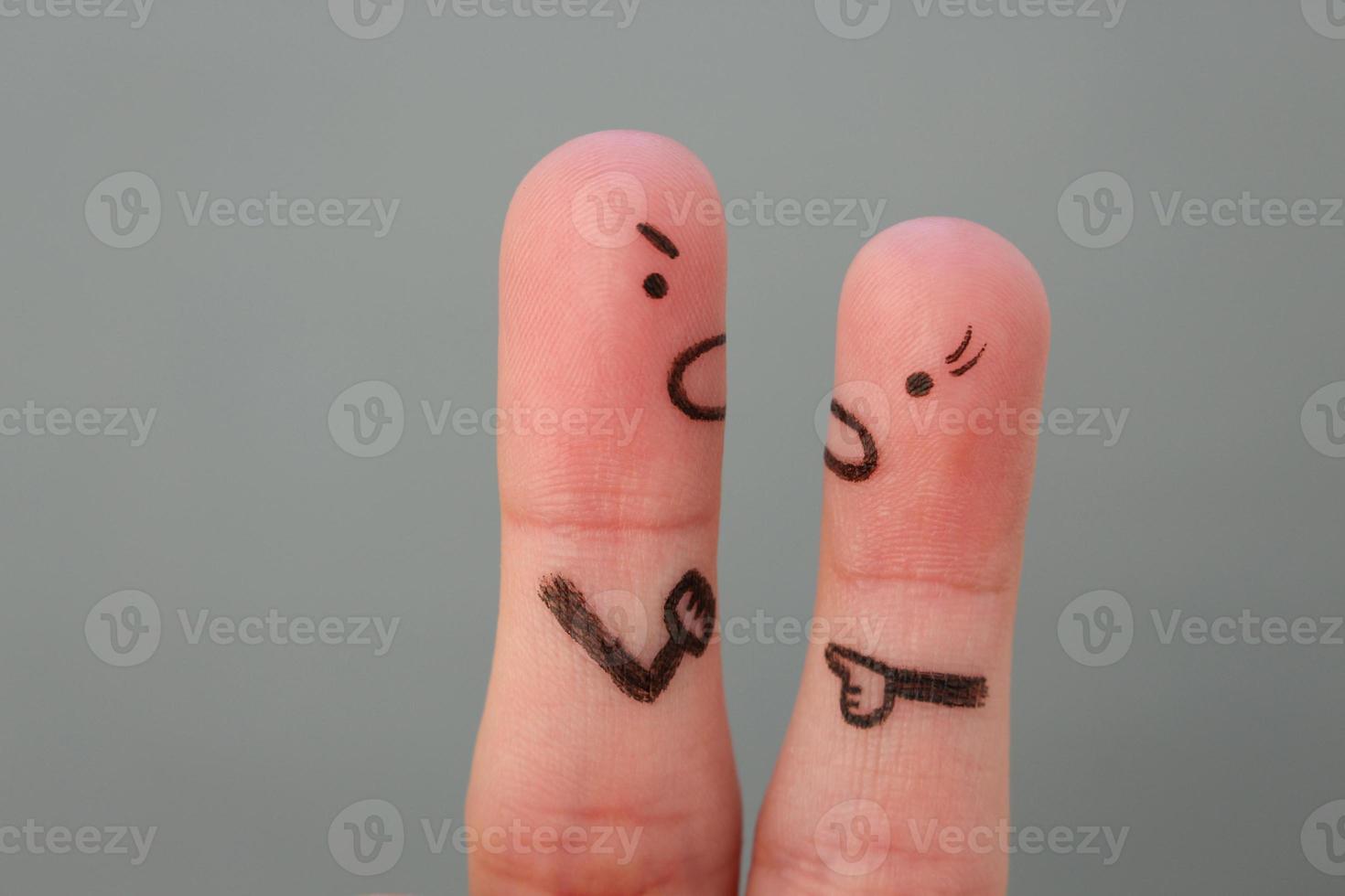 Fingers art of couple in quarrel. Man and woman swear. photo