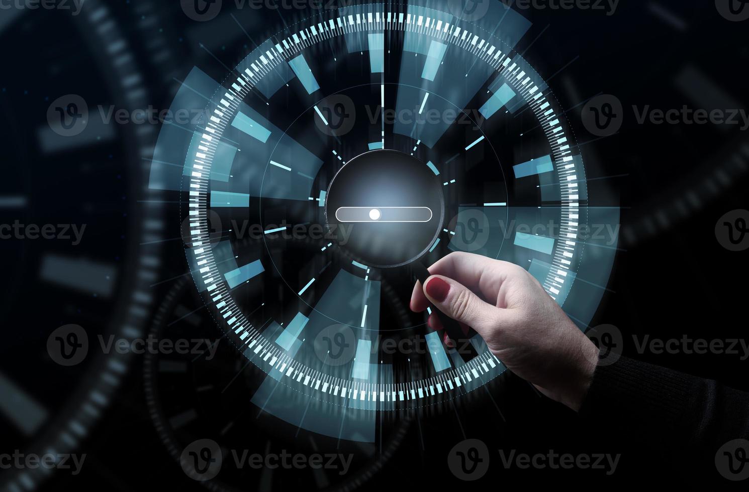 A woman's hand holds a magnifying glass and a virtual bar for entering and posting information photo