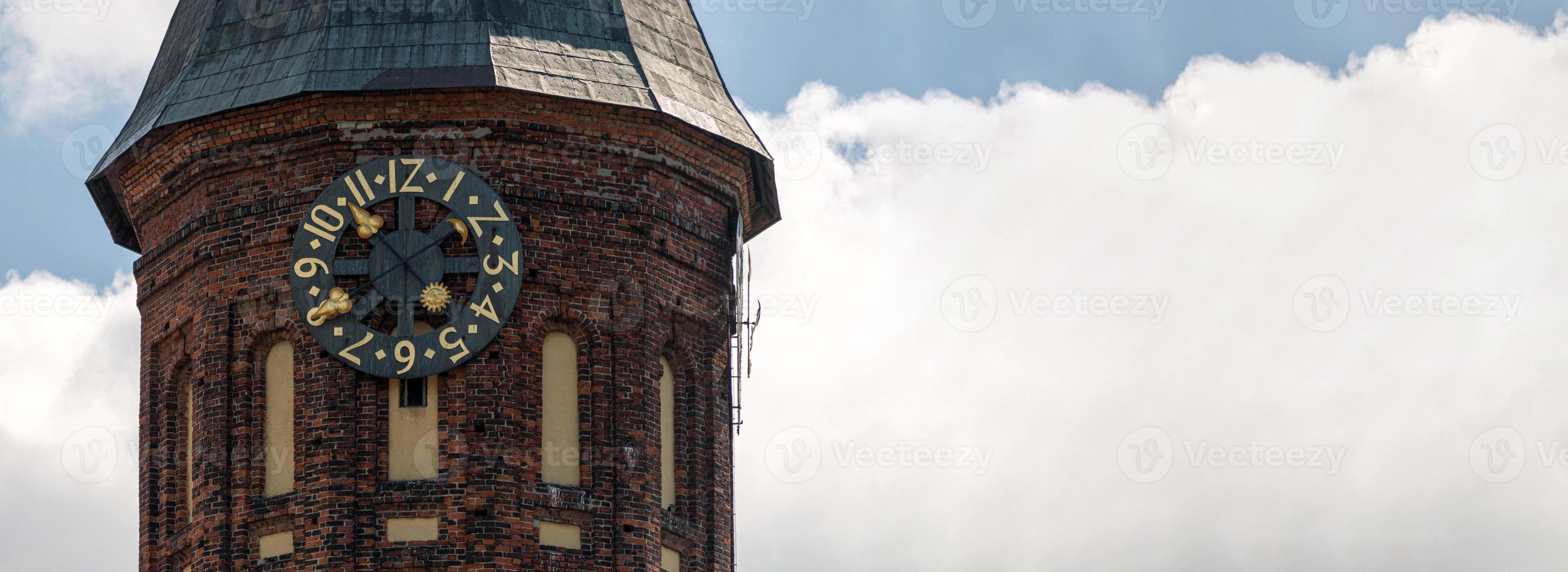 Clock tower of Konigsberg Cathedral, copy space. Brick Gothic-style monument in Kaliningrad, Russia. Immanuel Kant island. photo