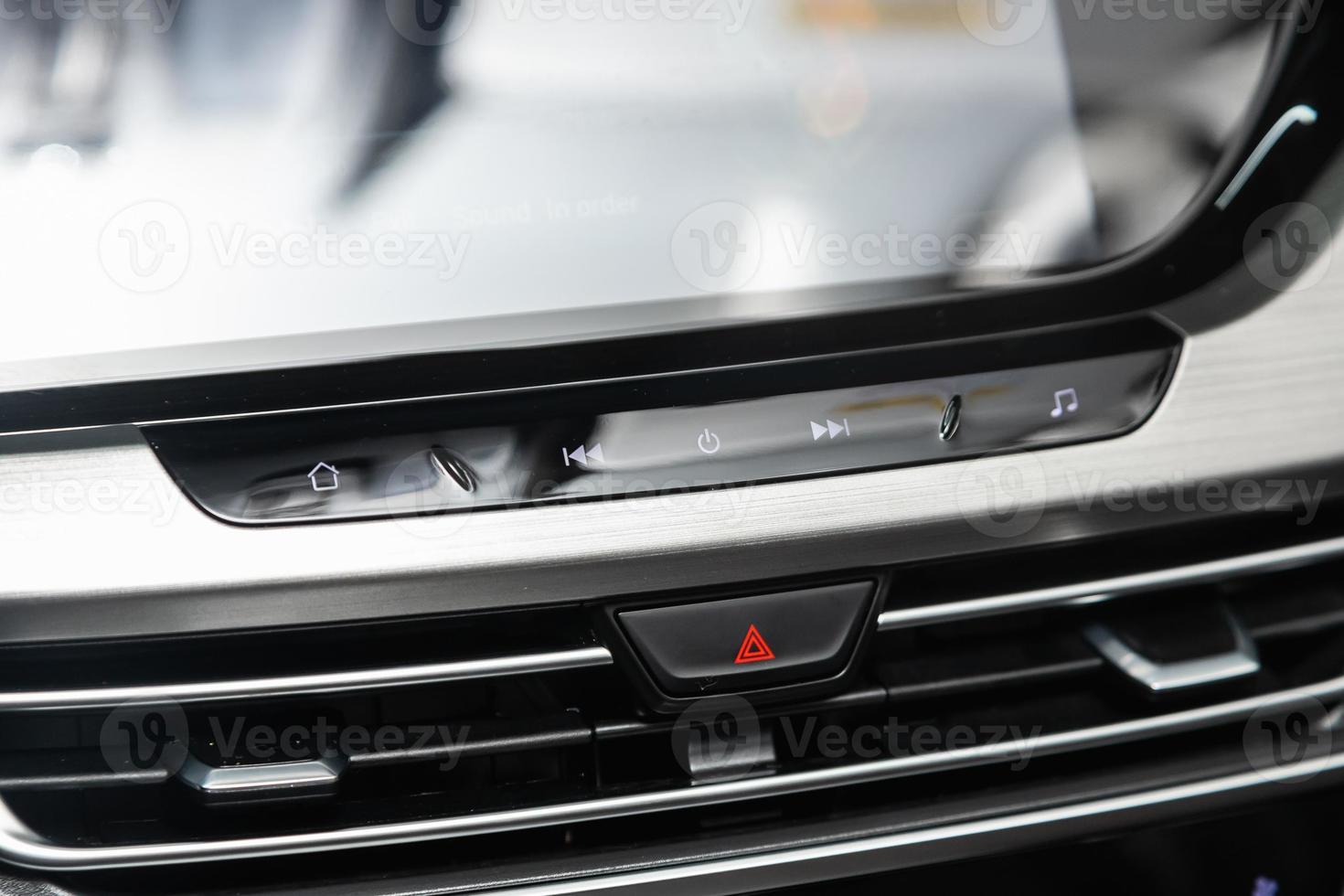 close up of  red   alarm buttons on car panel, no trade marks photo