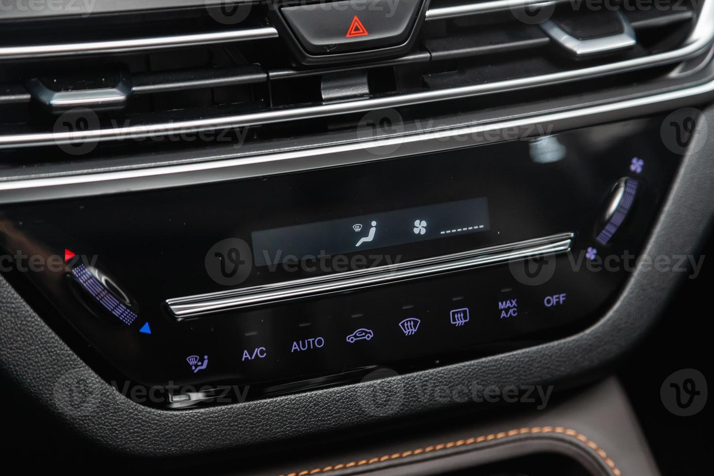 Car, vehicle interior with visible climate controls, adjustment of the fragment of instrument panel. photo