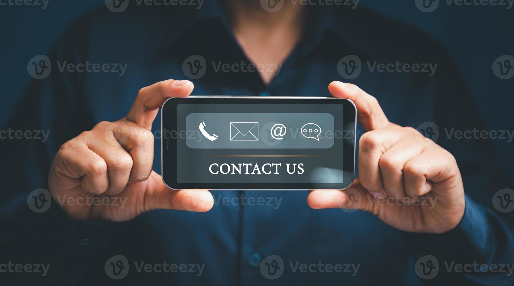 Woman hand using smart phone, Contact us connection concept. Contact us or Customer support hotline people connect. virtual screen contact icons  email, address, live chat, internet wifi photo