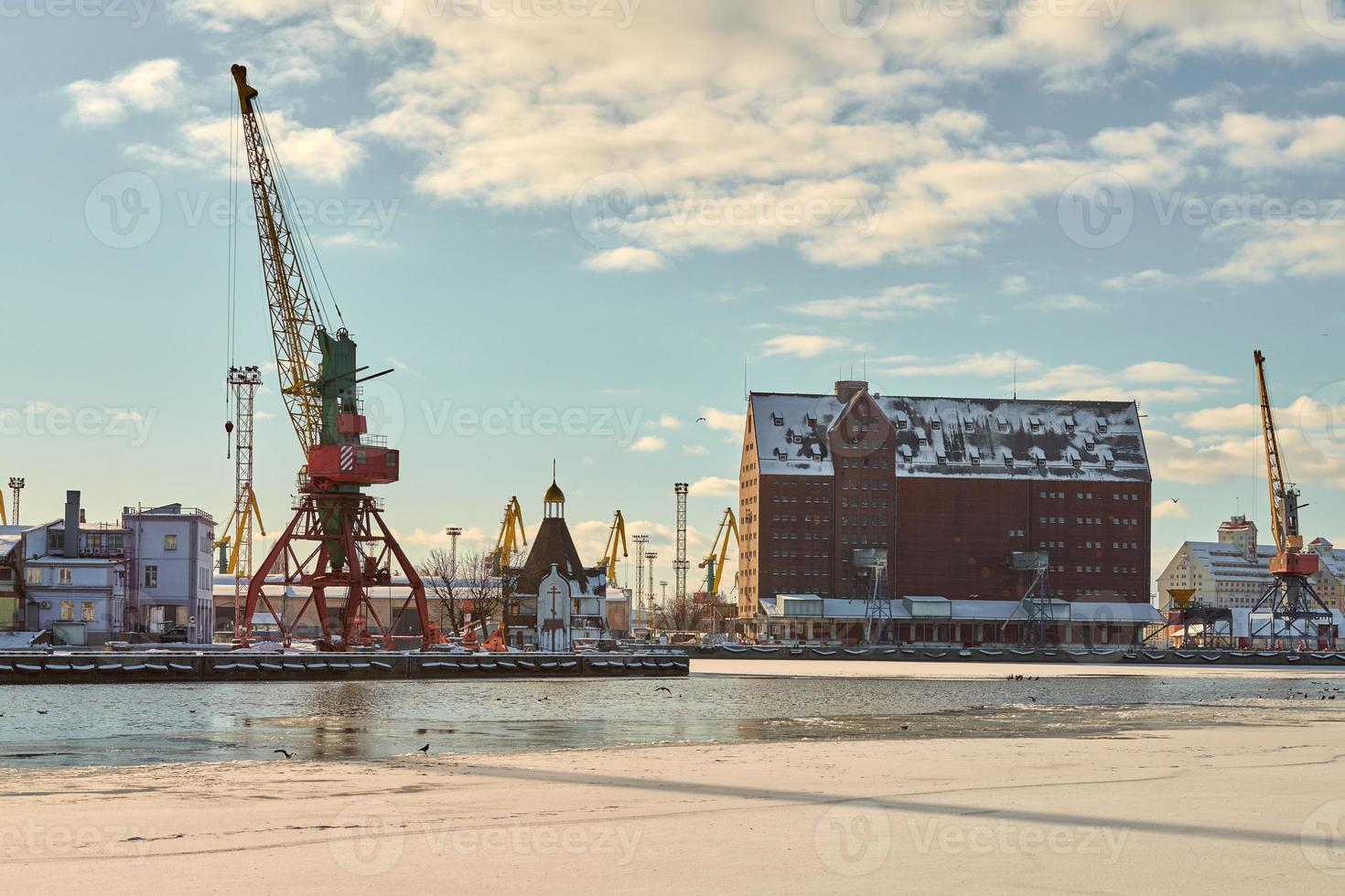 Harbor cranes, container ship terminal, cargo container yard photo