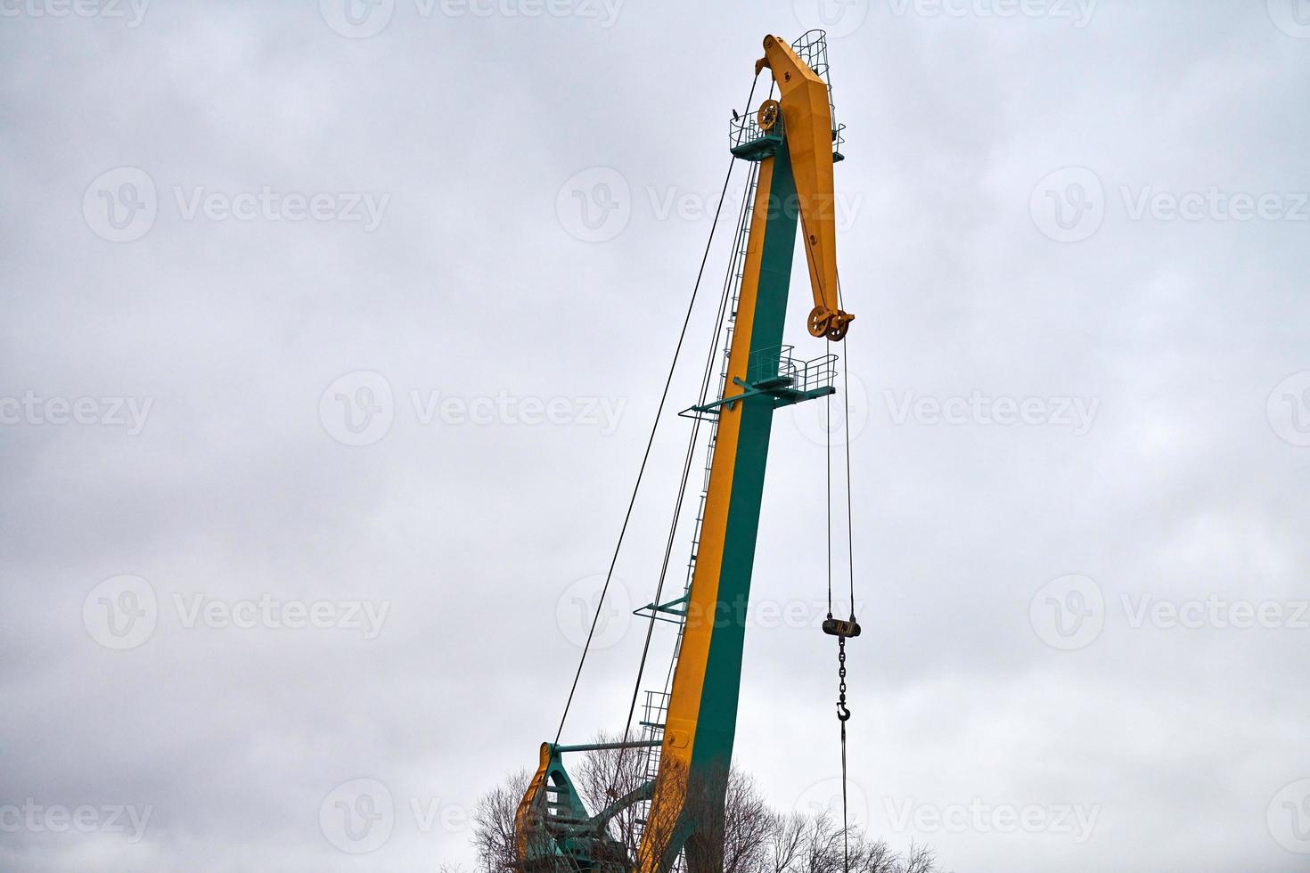 Cargo crane in container ship terminal, container yard photo