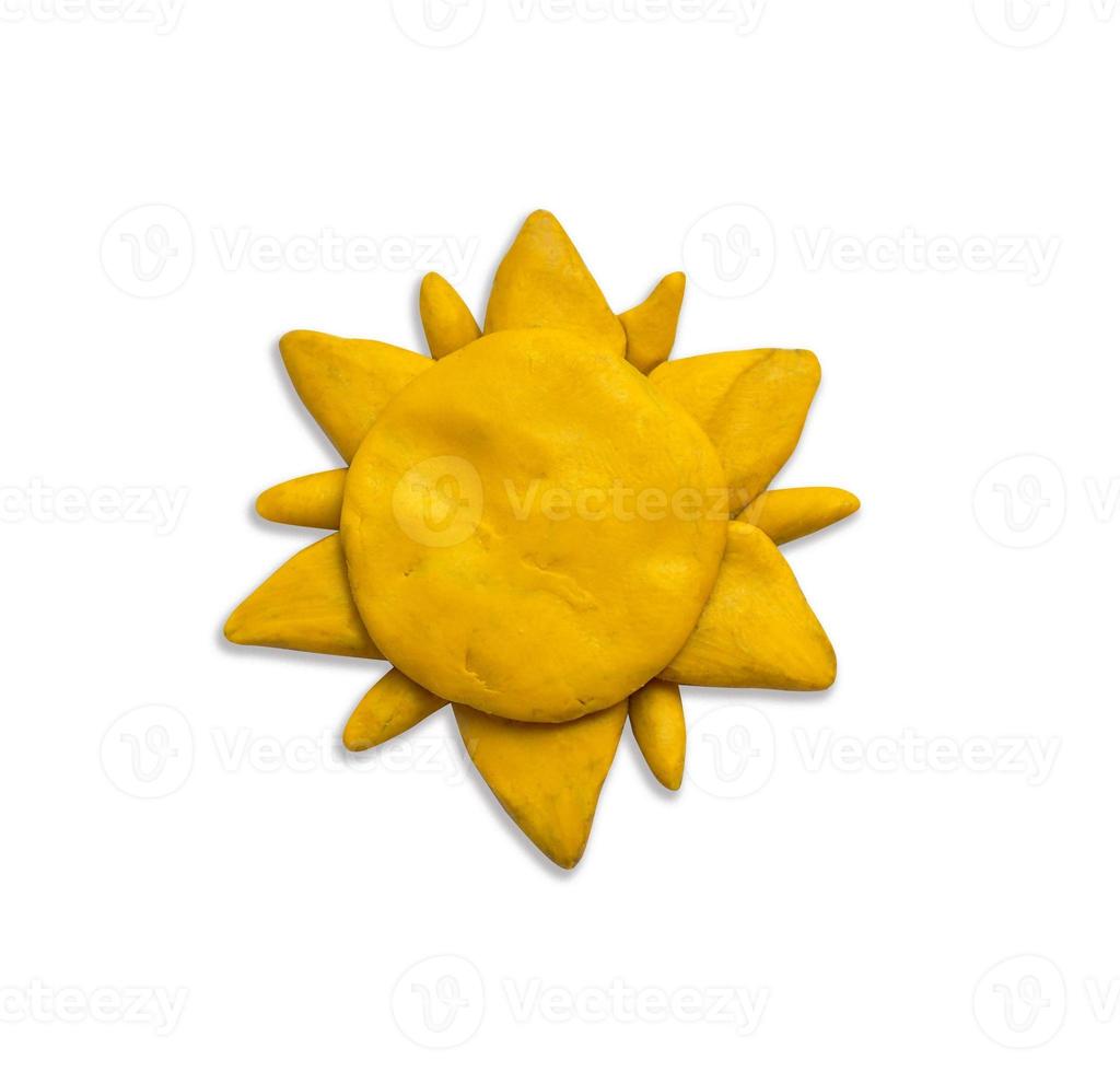 Plasticine sun isolated on a white background photo