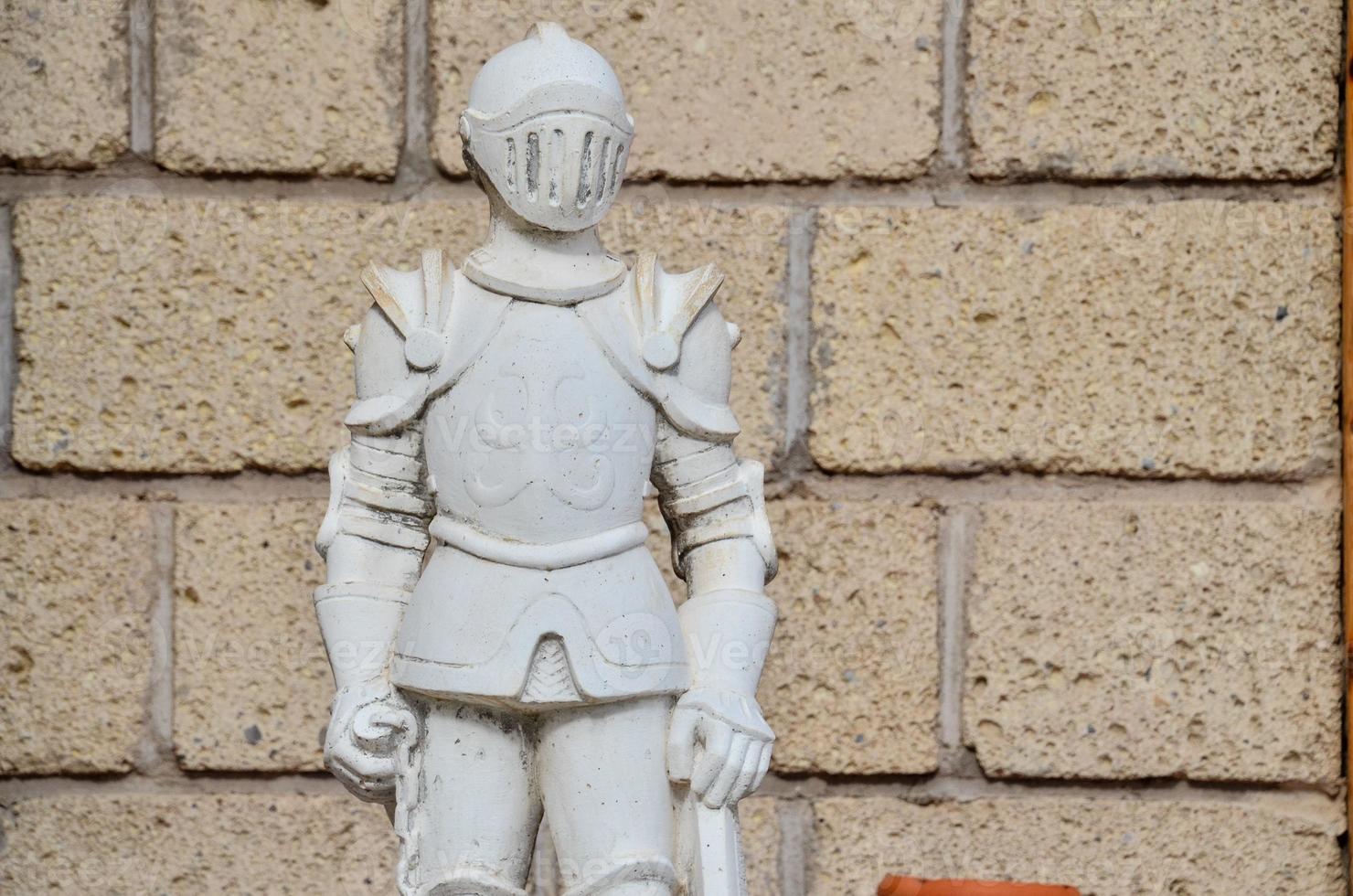 Stone knight statue photo