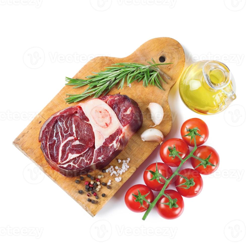 Cooking ingredients. Fresh raw meat beef steak with bone. photo