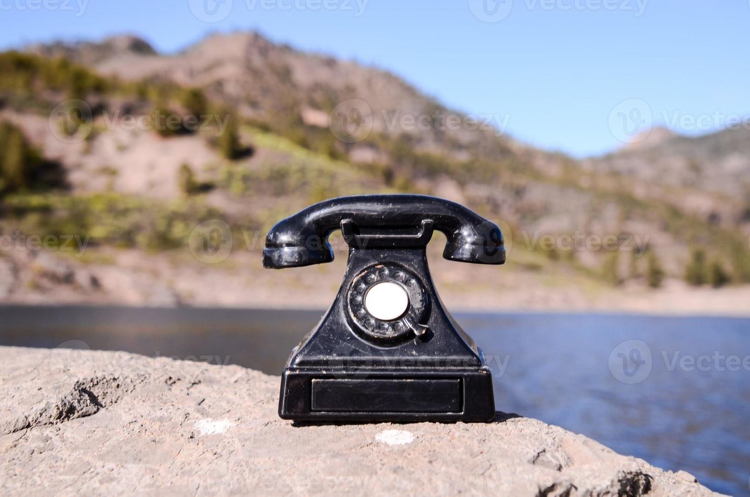 Telephone on the rock photo