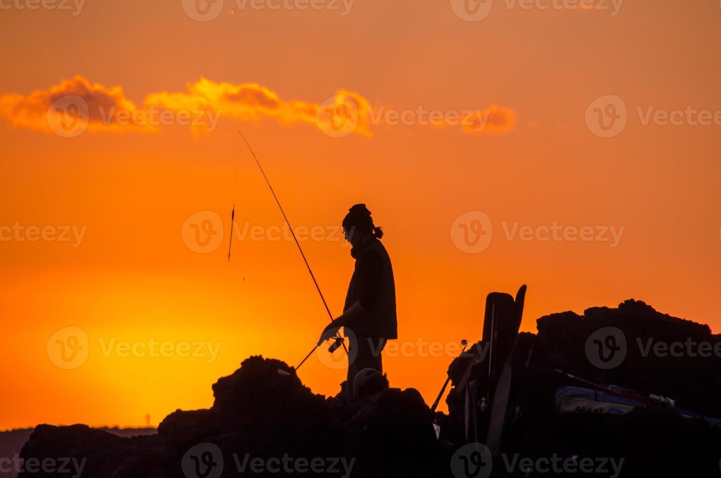 Fishing on the coast photo