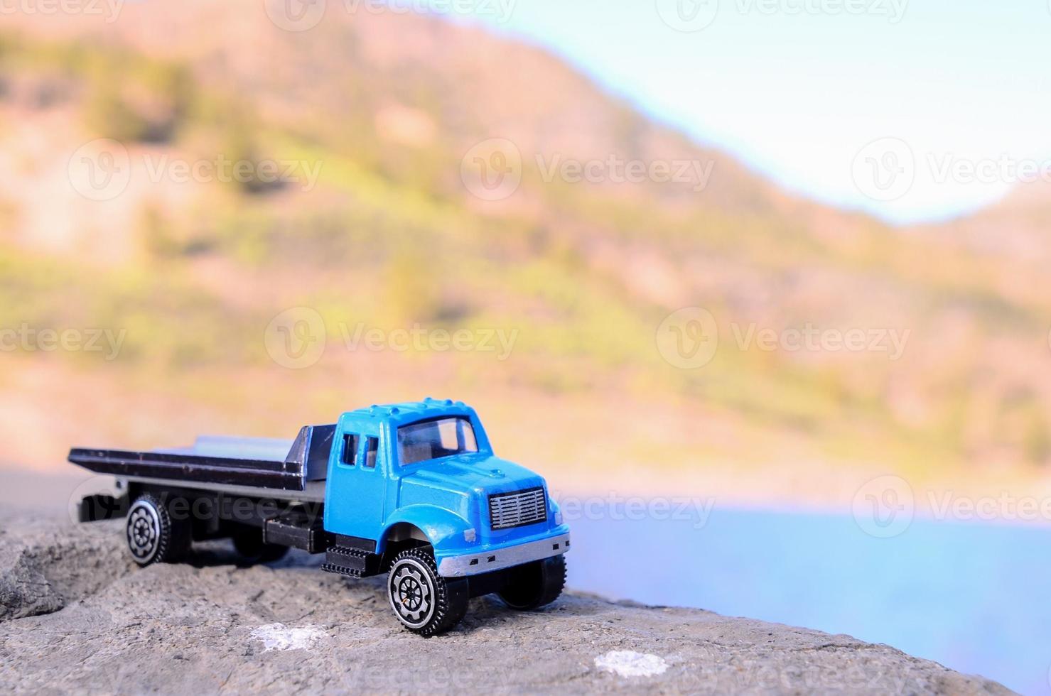 Toy truck on the rock photo