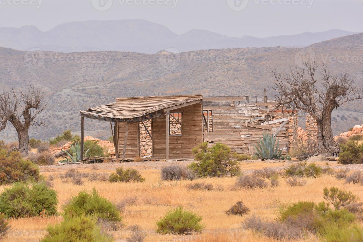 Abandoned structures in the desert photo