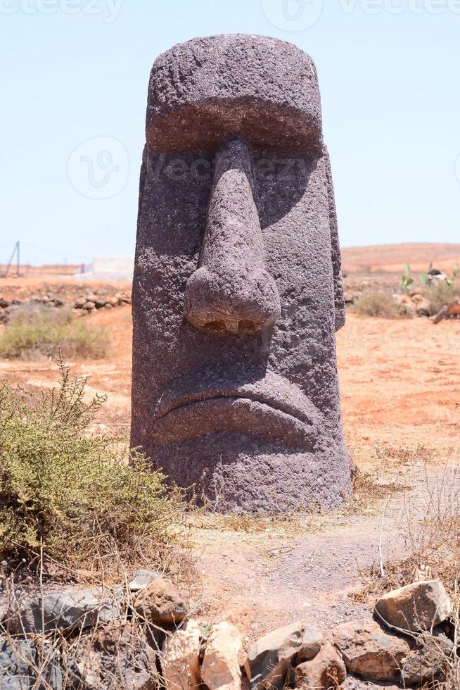 Moai statue in the desert 21751812 Stock Photo at Vecteezy