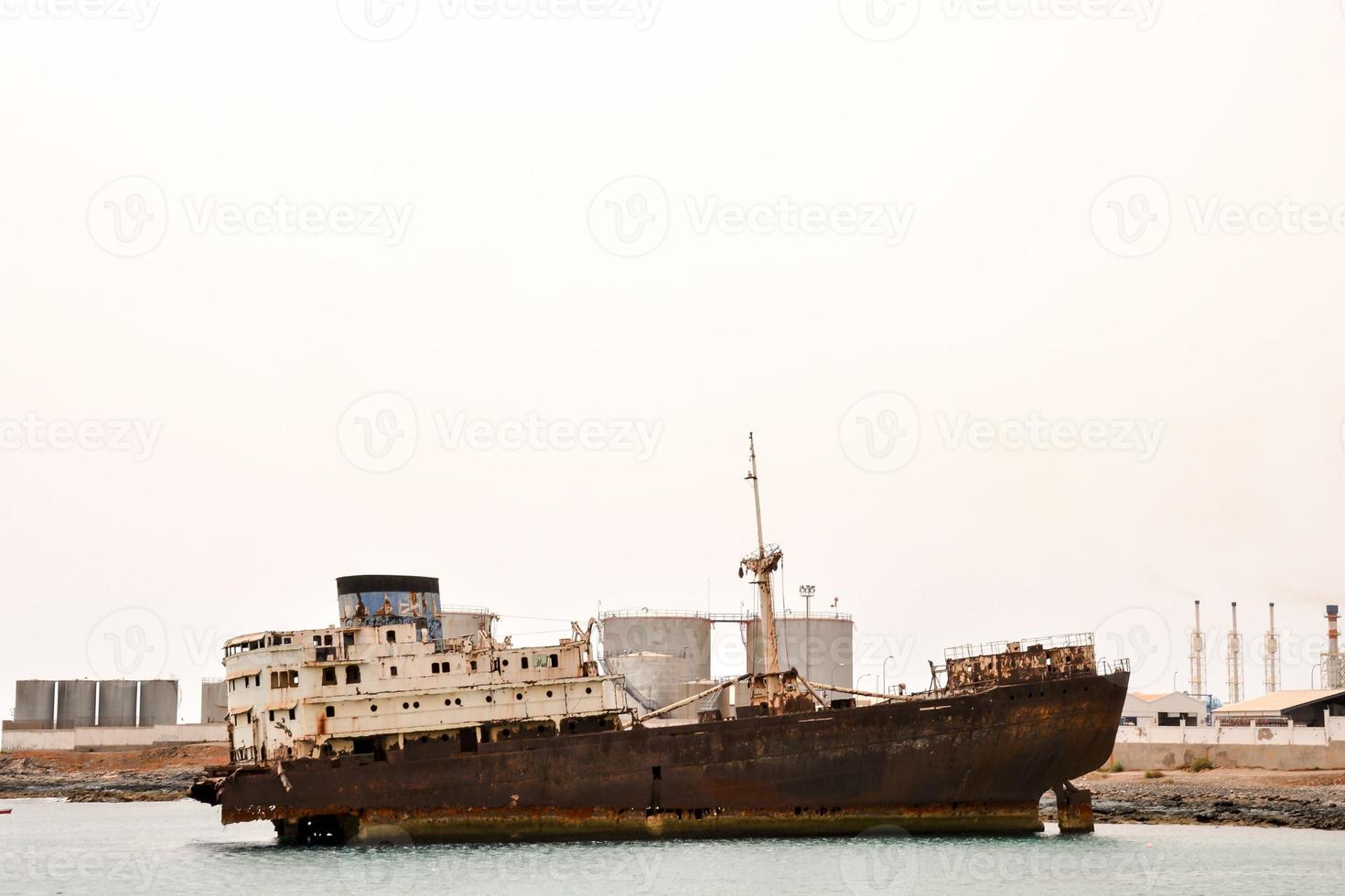 Rusty abandoned ship photo