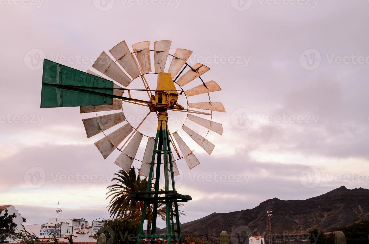 Traditional agricultural windmill photo