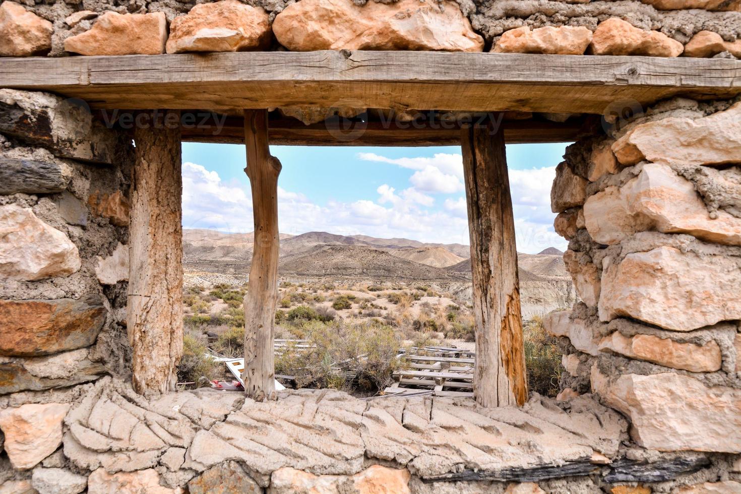 Abandoned structures in the desert photo