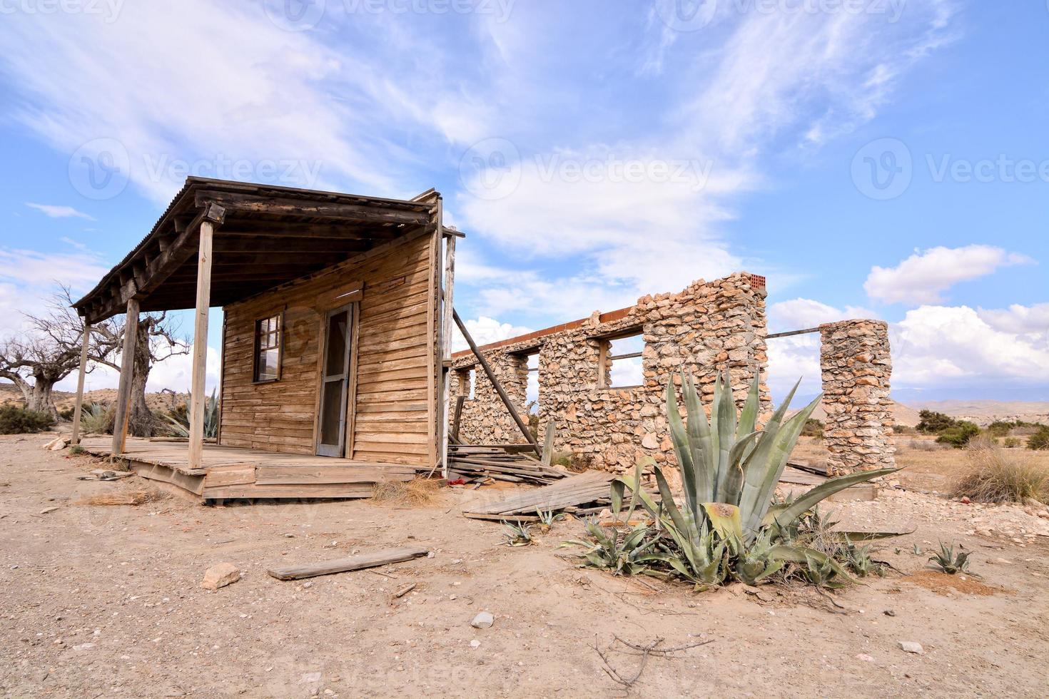 Abandoned structures in the desert photo