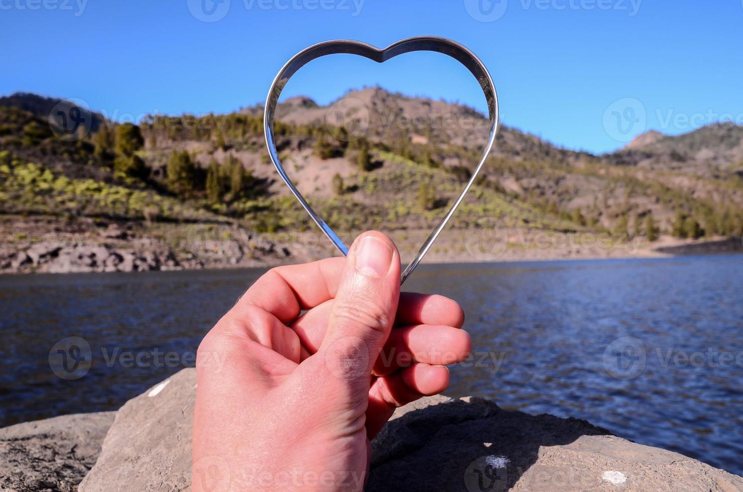 Heart and mountain landscape photo