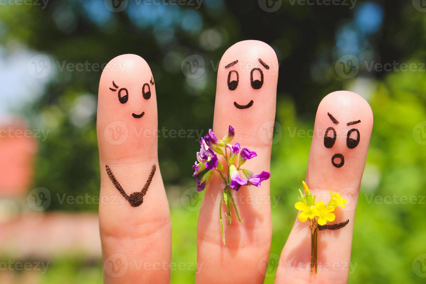 Finger art. Men give flowers flowers to a woman. photo