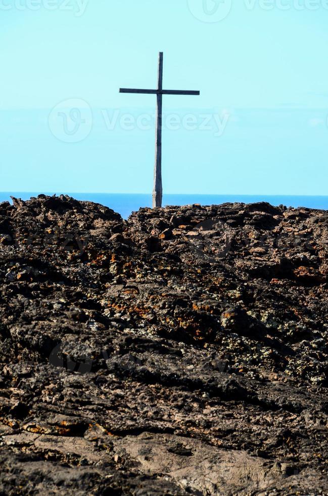 Large cross on the coast photo