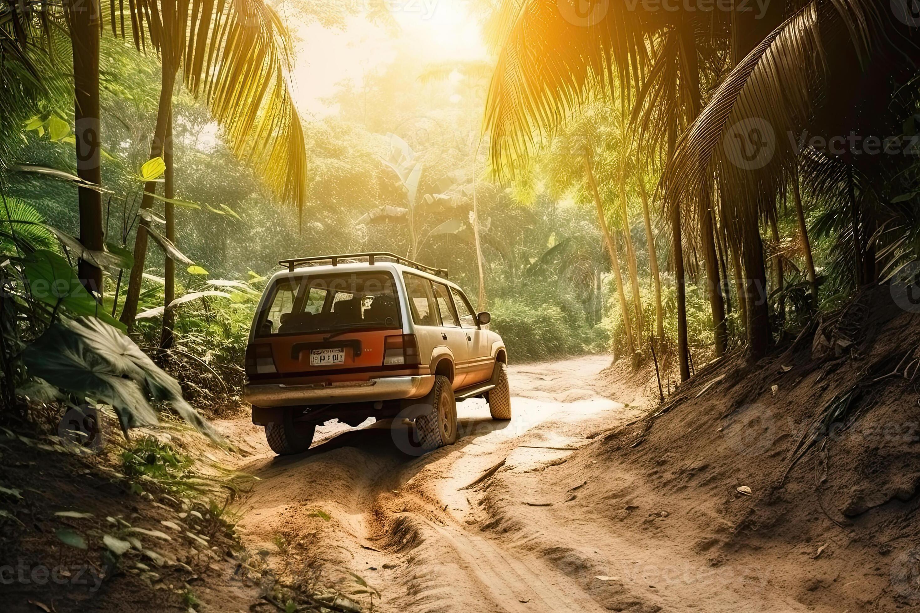 Four wheel drive SUV is driving on muddy road in jungle. Jeep on safari