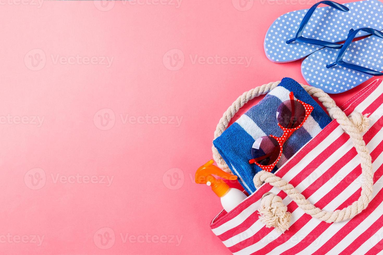 Summer bag background with copy space. Flat lay photo on color table, travel concept. Free space for text, mock-up