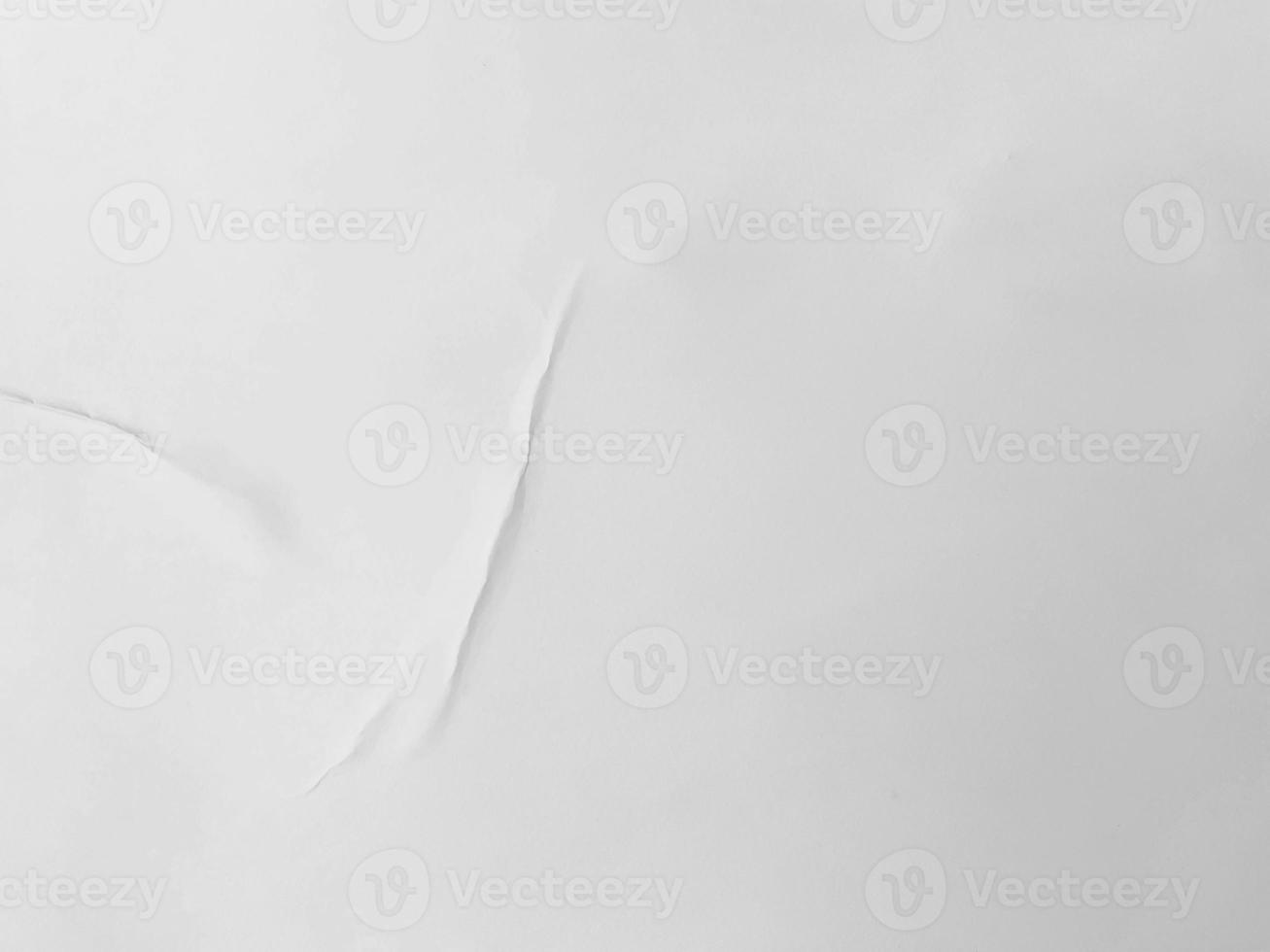blank white glued paper for poster texture overlay. Crumpled and wrinkled for background. matted wet paper for mockup posters, flyer, brochure, and banner design photo
