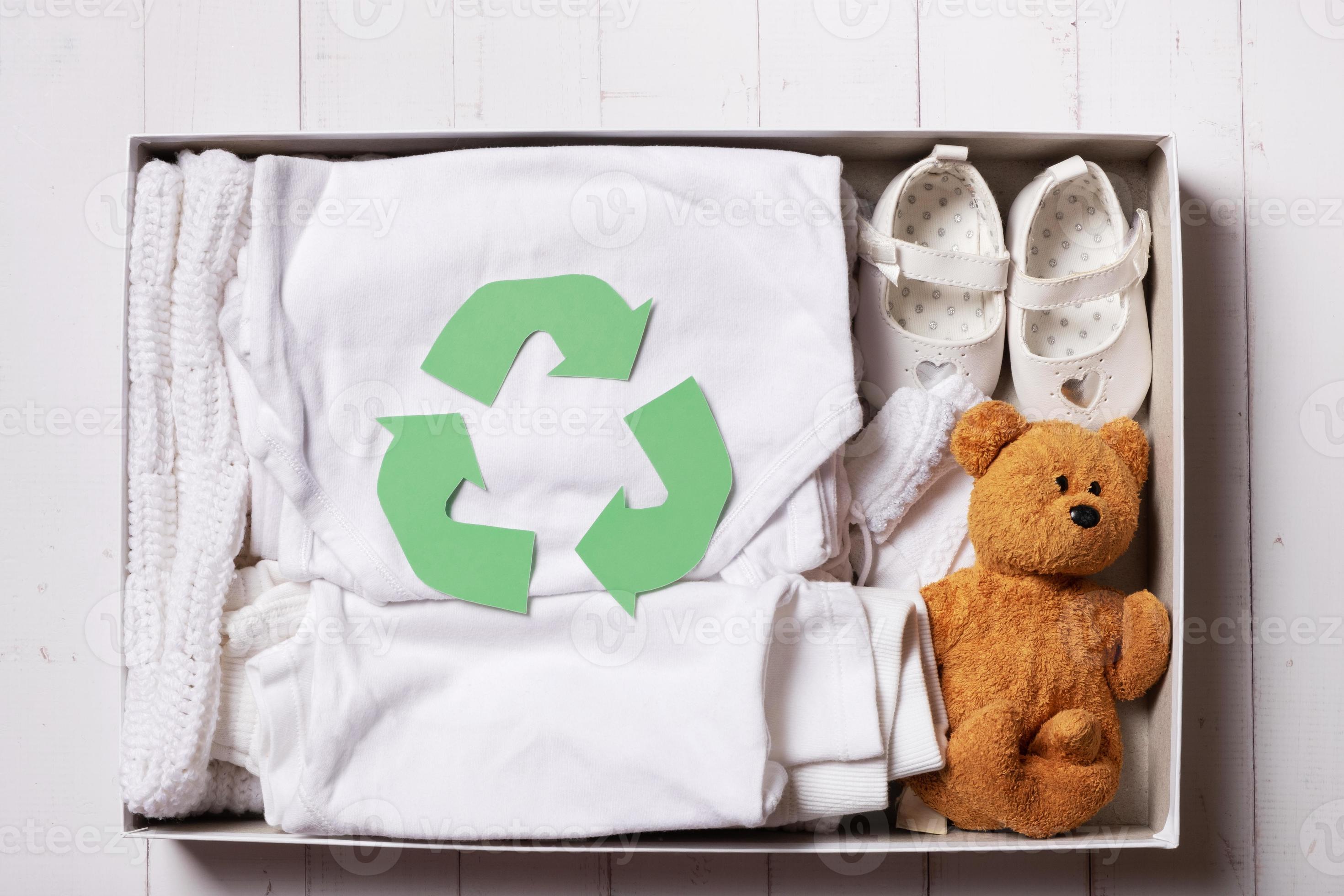 Children's clothes, shoes and toys in donation box. Second hand, clothing  recycling, reuse concept 21755667 Stock Photo at Vecteezy