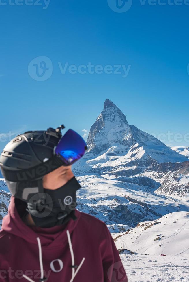 Young snowboarder spending winter holidays in Zermatt, near the famous