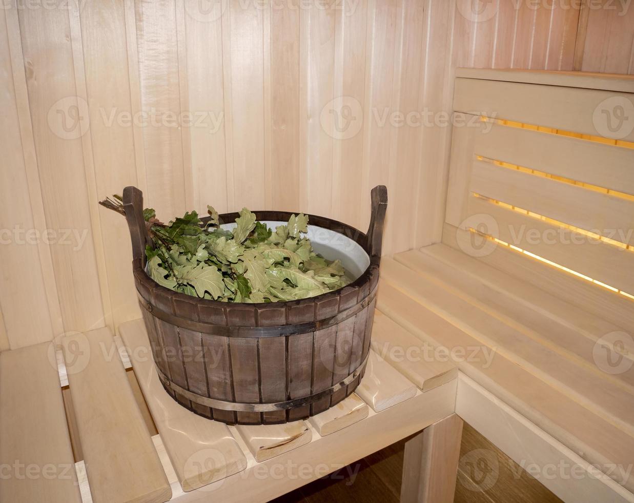 Finnish sauna interior, classic wooden sauna, Russian sauna, sauna accessories in a village bath. SPA concept photo