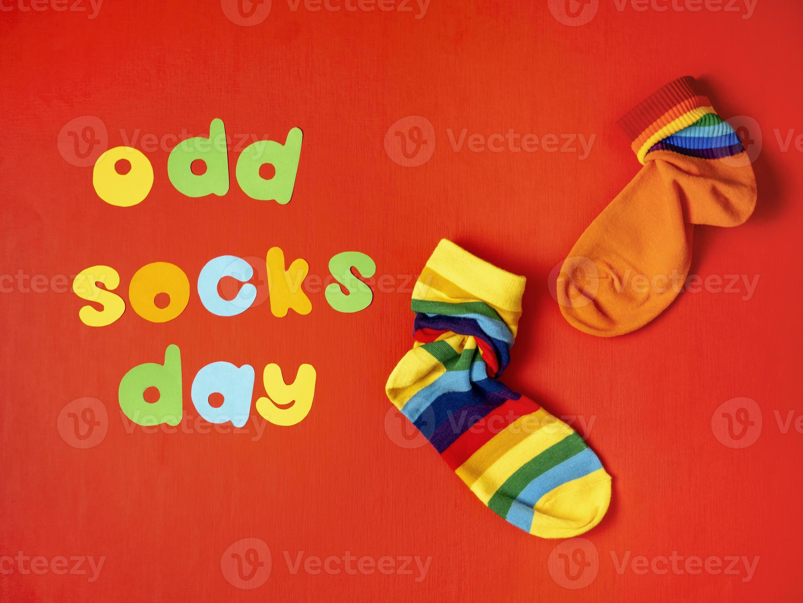 Odd Socks Day. Lonely Sock Day. The social problem of bullying. Strange socks as a symbol of