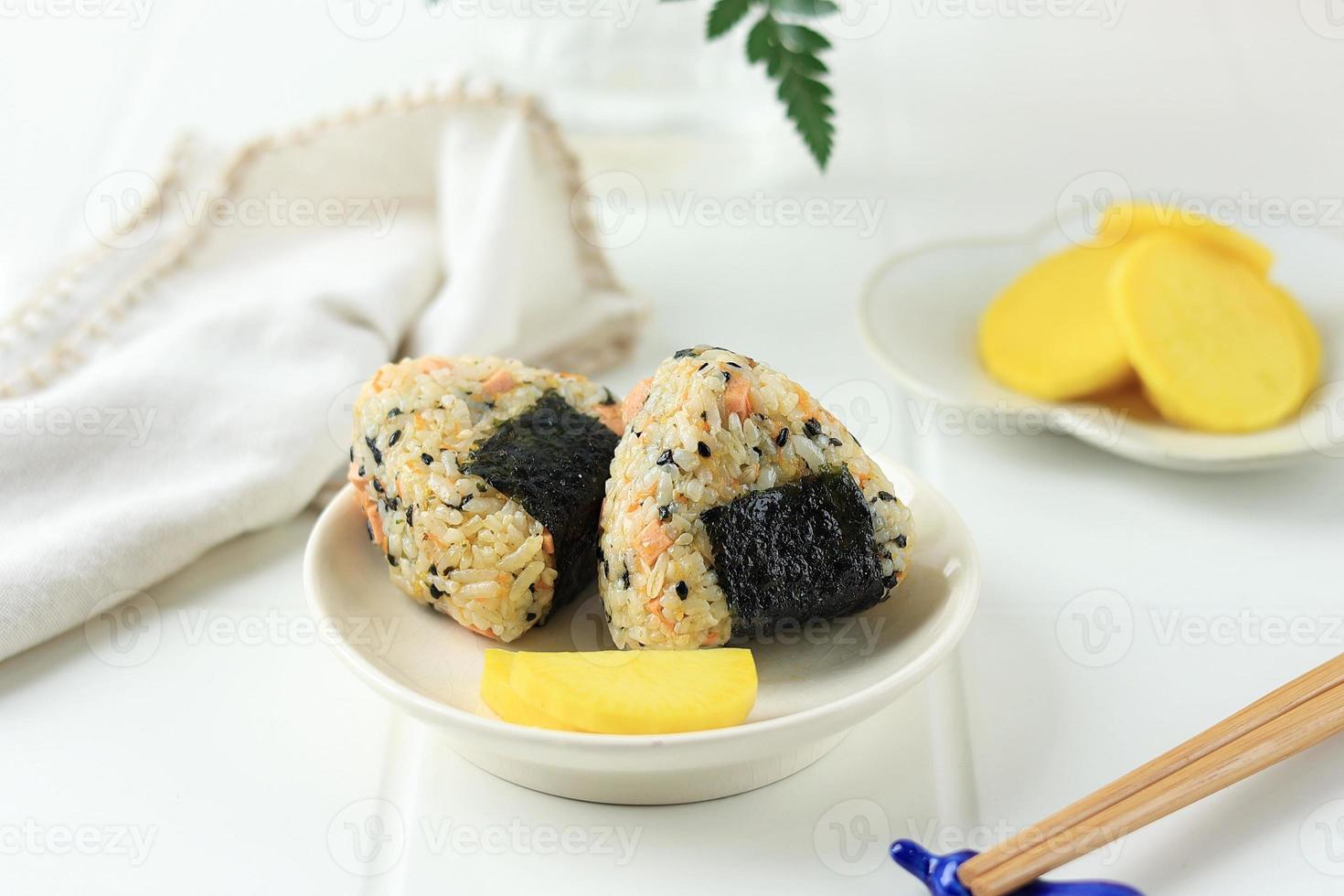 Triangle Japanese Onigiri with Sesame Seed, Sausage, Nori, and Ham. photo